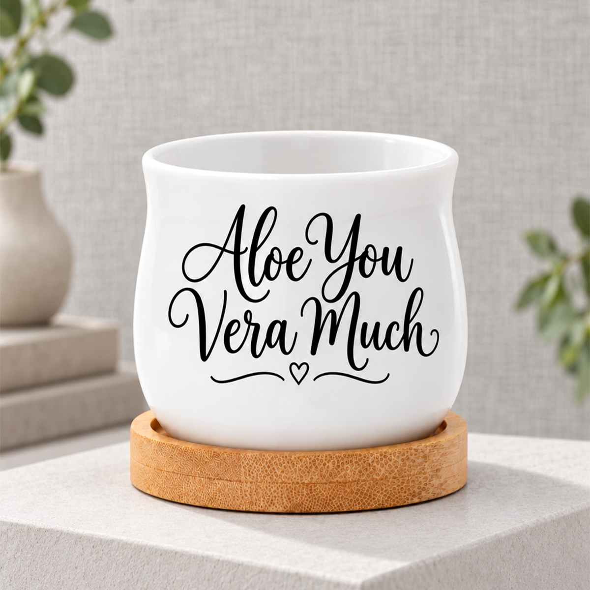 ceramic Succulent Pot - Aloe You Vera Much for sale, small white curved pot with included saucer, tabletop planter with natural wood tray, perfect for small plants or candle displays