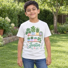 botanical personalized kids shirt cozy pastel style for sale, serene plant-inspired pattern on lightweight breathable material, cozy relaxed silhouette designed for active kids, soothing earthy botanical aesthetic with modern appeal, durable quality garment built to last through play, perfect layering piece for spring and summer wardrobe, meaningful personalized gift for plant-loving families