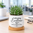 buy personalized ceramic mini pot for corporate favor cultivating excellence online, white barrel design with included bamboo tray, small desktop planter size, great for tea light candles or dried flower arrangements