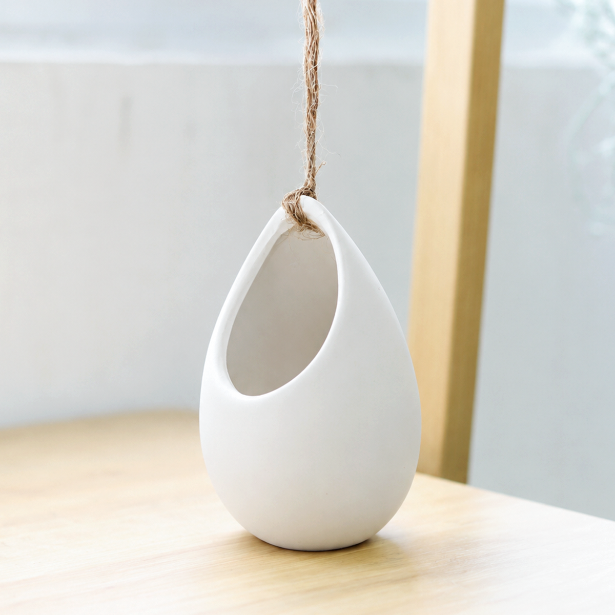 3 inch ivory ceramic hanging planter with flat bottom live plant for sale, clean white ceramic rounded vase silhouette, lightweight and durable finish, ideal for bromeliad or tillandsia caput medusae, easy-care no-soil growing style, bohemian hanging wall or shelf display, thoughtful housewarming or birthday
