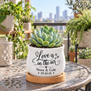 charming personalized ceramic wedding favor pot for sale, versatile mini planter for candles or botanicals, custom names and date printed, includes natural wood drainage tray, couple keepsake