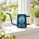 pink metal watering can plant lady for sale, soft pink powder-coated finish with sturdy metal frame, long reach spout for precision watering, contemporary garden tool design, perfect for balcony planters and container gardens, thoughtful present for gardening enthusiasts