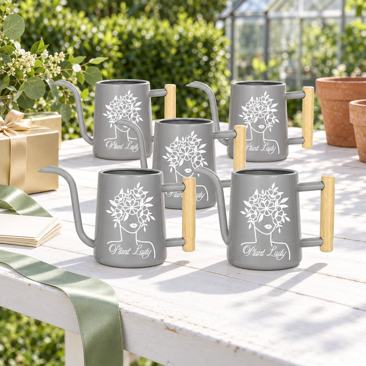 buy Pack of Metal Watering Can - Plant Lady 20-pack gray online, extensive collection of silver-gray cans, sturdy metal craftsmanship, classic vintage silhouette, great for small houseplants, great gardening gift
