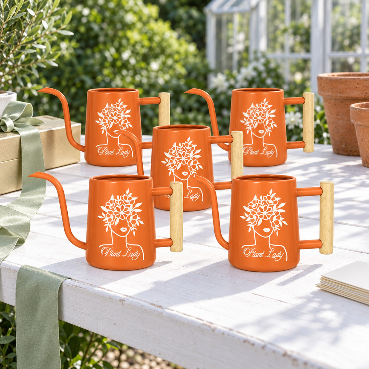 buy Pack of Metal Watering Can - Plant Lady 30-pack pink online, bulk pack of rose-colored waterers, durable painted finish, ergonomic handle structure, great for small houseplants, beautiful housewarming gift