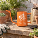 pink metal watering can plant lady for sale, soft pink powder-coated finish with sturdy metal frame, long reach spout for precision watering, contemporary garden tool design, perfect for balcony planters and container gardens, thoughtful present for gardening enthusiasts