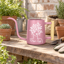 pink metal watering can plant lady for sale, soft pink powder-coated finish with sturdy metal frame, long reach spout for precision watering, contemporary garden tool design, perfect for balcony planters and container gardens, thoughtful present for gardening enthusiasts