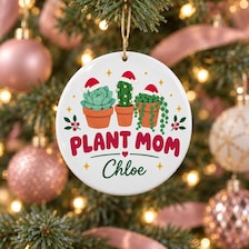 buy personalized plant mom christmas ornament online, customized with personal touches and holiday flair, premium material with lasting quality, circle pot design element, perfect for celebrating plant parents, meaningful christmas gift for garden lovers