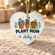 acrylic personalized plant mom christmas ornament for sale, transparent acrylic with personalized engraving, vibrant colors and clear finish, heart pot shape detail, perfect for hanging on christmas trees, memorable gift for plant mom celebrations