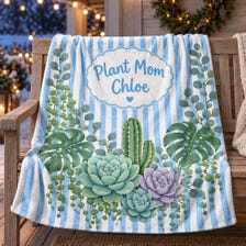 50x60in Personalized Plant Mom Striped Succulent Blanket live succulent for sale, delightful pastel succulent illustration with eye-catching striped detail, generous oversized dimensions for full-body comfort and layering, premium quality fabric with durable long-lasting weave, celebrates green thumb lifestyle and plant parent identity, perfect cozy throw for plant-filled rooms and garden lounging, wonderful personalized gift for friends and family who love plants