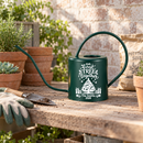 custom engraved personalized watering can our first tree together for sale, polished metal body with romantic tree motif and name customization, balanced form with long curved spout, available in a sleek silver tone finish, great for small houseplants and tabletop planters, unique personalized gift for newlyweds or couples celebrating a milestone