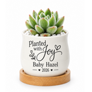 buy personalized ceramic mini pot for baby shower favor planted with joy online, glazed white finish with custom name printing, small decorative planter with included tray, charming botanical themed gift for expectant parents