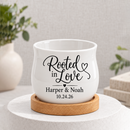 white barrel ceramic personalized succulent pot for wedding favor rooted in love for sale, mini planter holds dried botanicals or candle, custom printed names and event date, sweet favor keepsake for guests