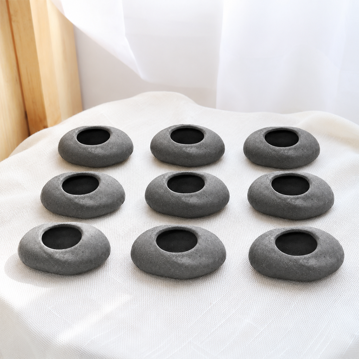 9 pack gray stone ceramic tillandsia air plant holder set live air plant for sale, minimalist gray stone ceramic vessels with natural texture and neutral aesthetic, air plants with wispy foliage that flourish in humid kitchen environments, scorches easily in intense south-facing light so prefers filtered indirect brightness, needs regular rotation to maintain balanced growth form, stunning bright windowsill decor, rare collector plant gift for modern plant lovers