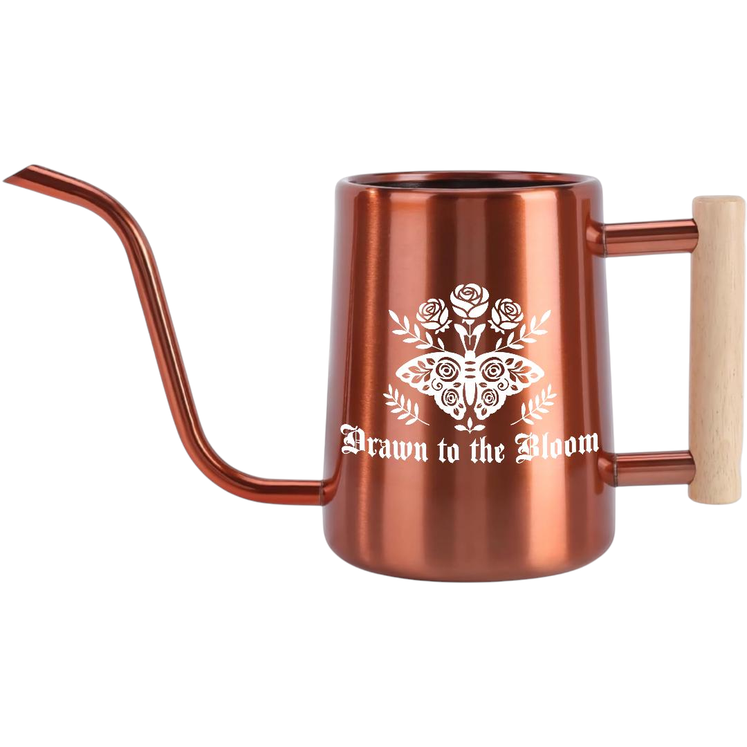 orange Watering Can - Drawn to the Bloom for sale, warm orange tone with drawn floral motif, sturdy construction with reinforced handle, practical design for frequent use, perfect for community gardens and shared planting spaces, thoughtful gift for garden community members