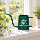 buy watering can drawn to the bloom black online, charming illustrated design with delicate floral artwork, durable plastic construction available in black orange gray or pink, ergonomic handle for easy pouring, ideal for indoor houseplants and garden beds, perfect gardening gift for plant enthusiasts