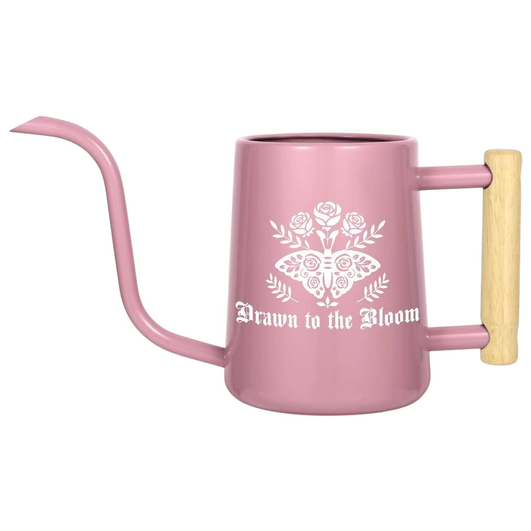 pink Watering Can - Drawn to the Bloom for sale, delicate pink coloring with charming botanical illustration, lightweight body for easy handling, curved spout for gentle watering, perfect for delicate flowering plants and raised beds, perfect gift for plant care enthusiasts