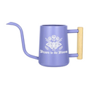 buy watering can drawn to the bloom black online, charming illustrated design with delicate floral artwork, durable plastic construction available in black orange gray or pink, ergonomic handle for easy pouring, ideal for indoor houseplants and garden beds, perfect gardening gift for plant enthusiasts