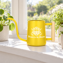 buy watering can drawn to the bloom black online, charming illustrated design with delicate floral artwork, durable plastic construction available in black orange gray or pink, ergonomic handle for easy pouring, ideal for indoor houseplants and garden beds, perfect gardening gift for plant enthusiasts