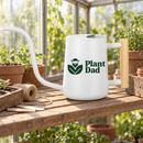 classic white watering can plant dad novelty design for sale, glossy white surface with playful plant dad slogan print, medium capacity with balanced pour spout, contemporary decorative style, perfect for watering small houseplants and desk plants, unique and thoughtful gift for fathers who love plants